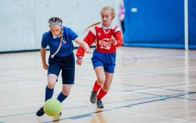 MIC League of Legends Soccer 2019 - Two players running with the ball. (Picture by Brian Arthur)