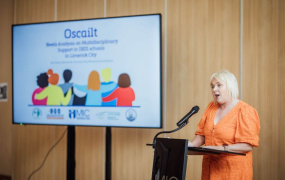 Tracie Tobin speaking at the launch of Oscailt report